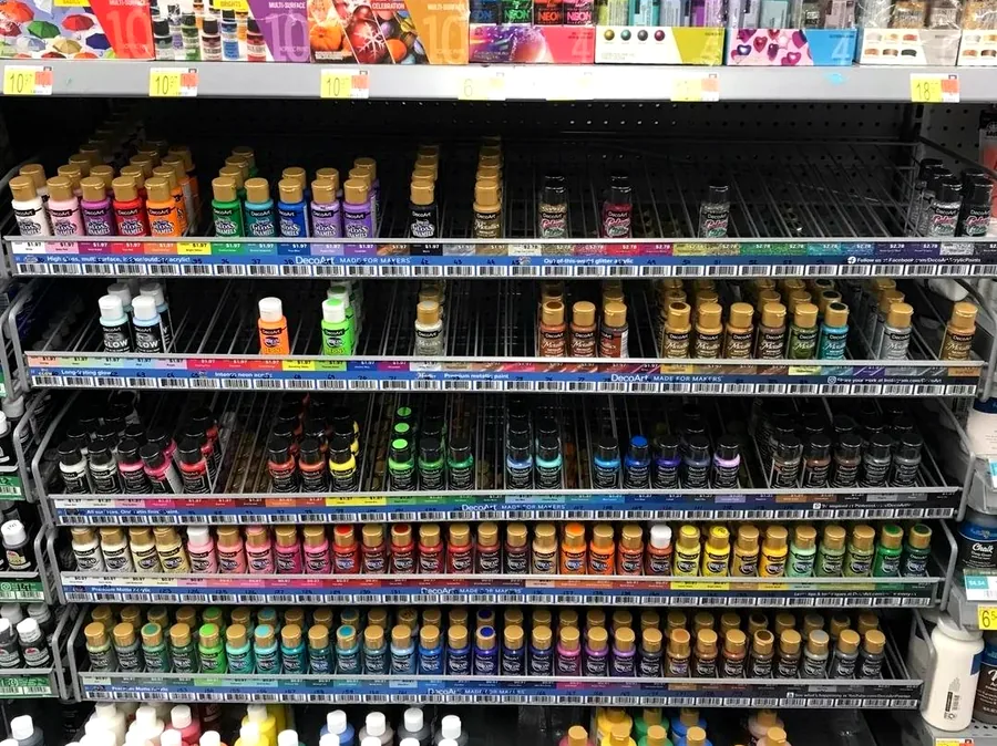 Shop shelves fully stocked with paint products from our brands