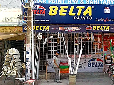 Paint drums, buckets and pipes displayed outside our shop front in New Karachi